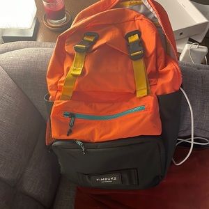Timbuk2 orange backpack with laptop sleeve